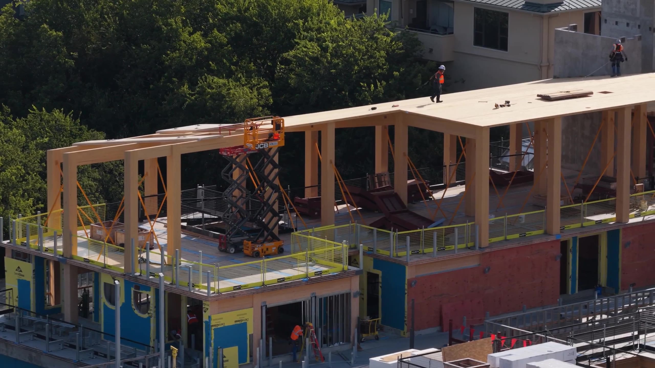 Timber frame and roof deck under construction