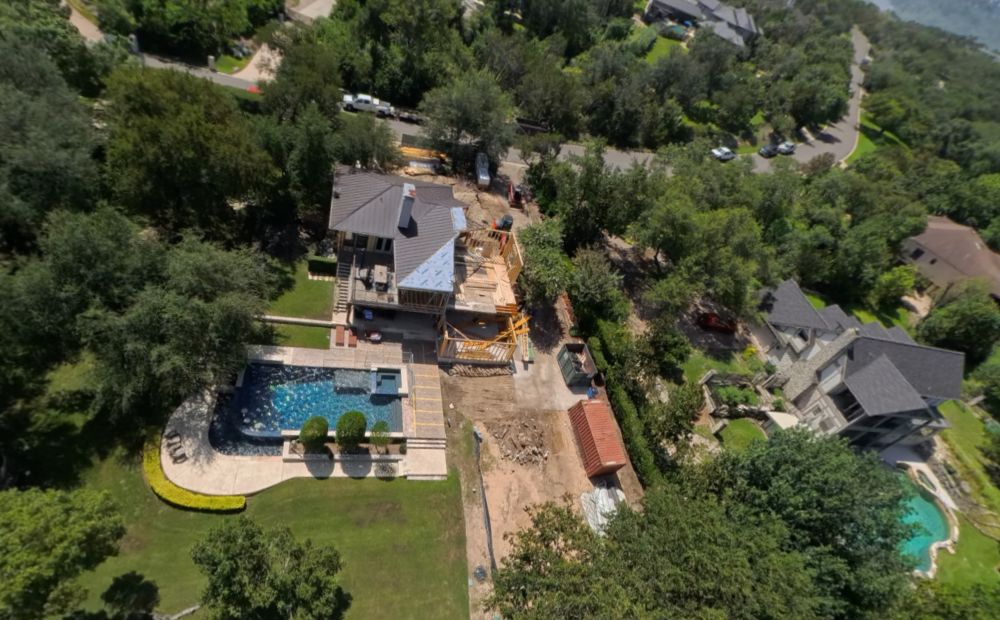 Aerial view of a West Austin residential property with pool